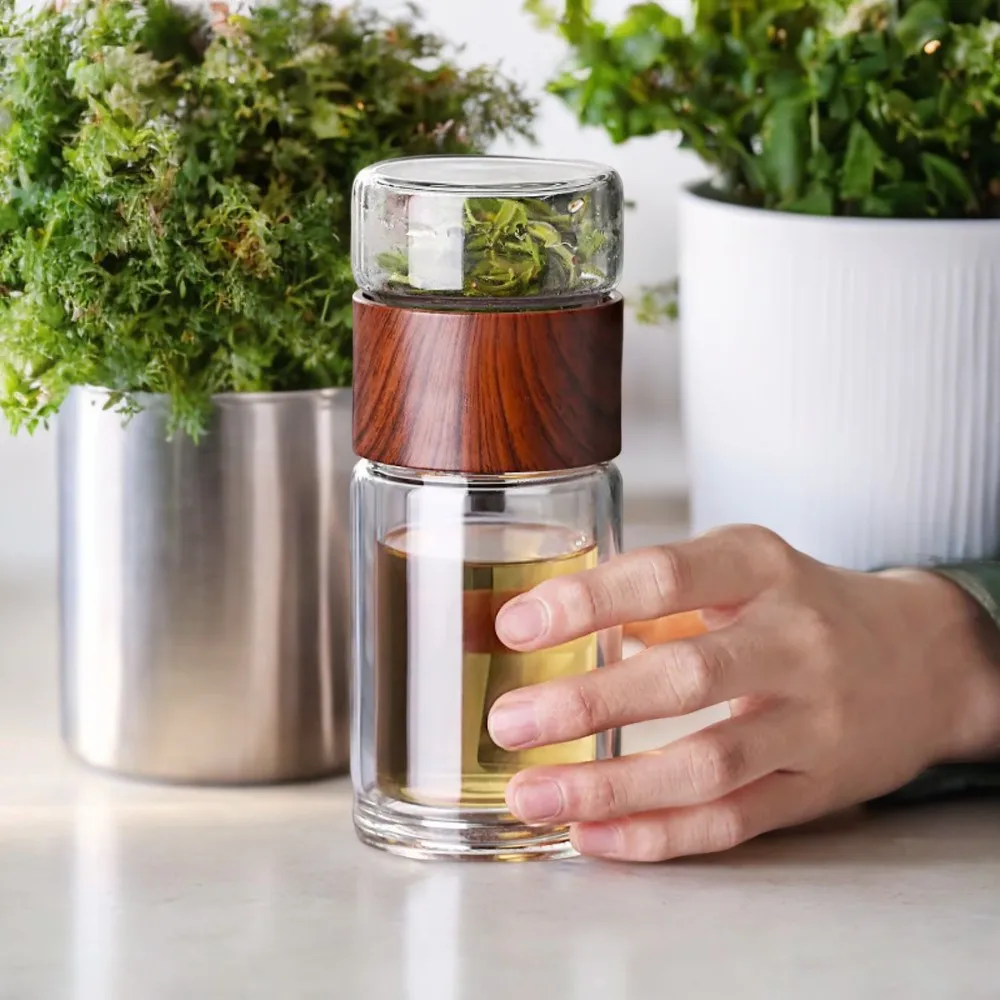 Elevate your hydration game with the sleek and portable Oneisall Double-Walled Glass Tea Water Bottle. Stay effortlessly stylish