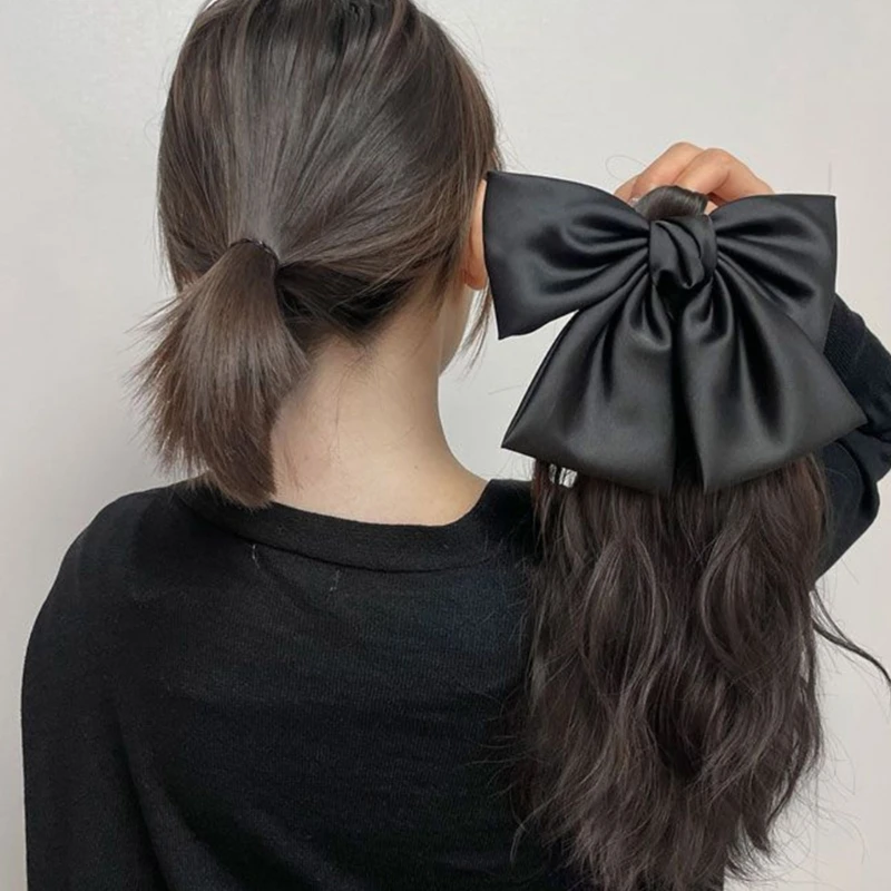 Synthetische Pferdes chwanz Haars pange Brunnen Pferdes chwanz Haar verlängerungen Bowknot natürliche lockige Haar verlängerungen elegante Haar