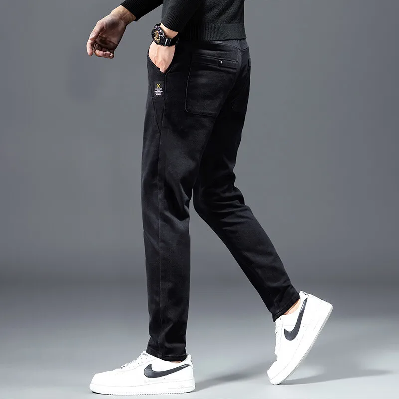 جينز رجالي على الموضة ملابس الشارع الشهير 2025 بقصة ضيقة ومريحة للربيع والخريف بنطلون جينز غير رسمي للرجال مقاس كبير مغسول كلاسيكي #4