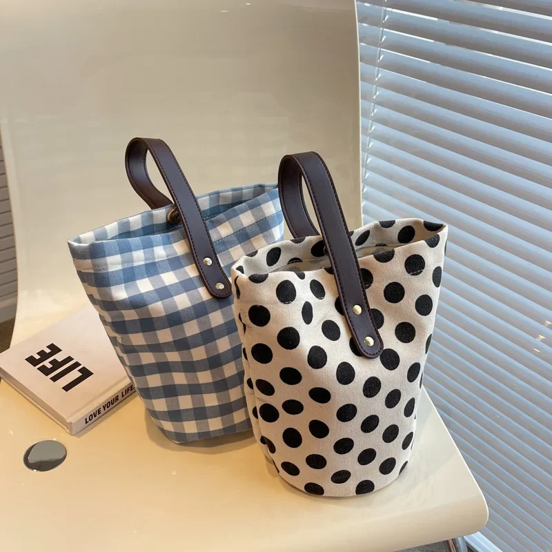 Small Fresh Polka Dot Canvas Bucket Bag Cute Ins Wind Handbag Large Capacity Lattice Bento Bag Commuter Women's Bag