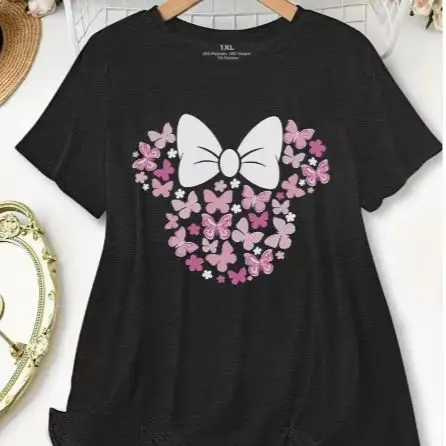 

Plus - Size black crew neck t-shirt with an inspired bow and butterfly graphic: whimsical and cute