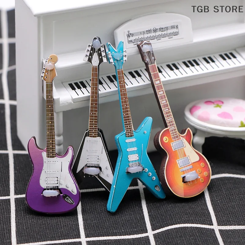1Pcs Beliebte Gitarre Miniatur Simulation Mini Elektrische Gitarre Puppenhaus Szene Requisiten Spiel Modell Zubehör