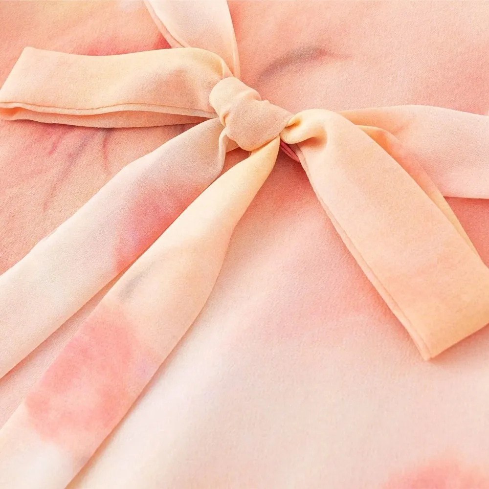 2025 Romantico arancione sfumato stampa floreale volant colletto a V manica a sbuffo abito longuette donna cravatta fiocco telai una linea abiti lunghi veste