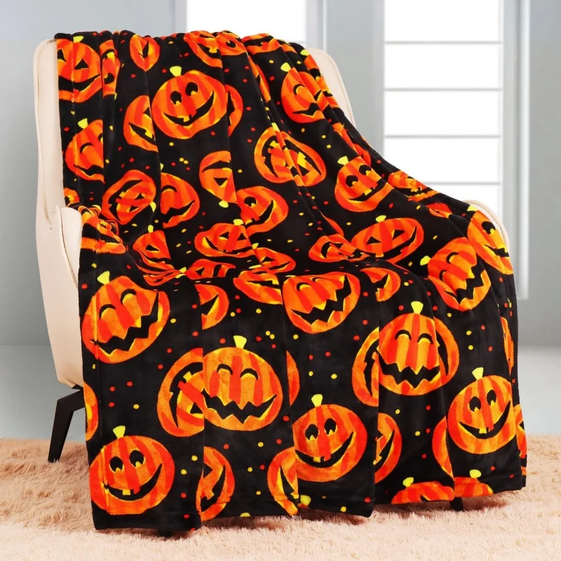 

Halloween reversible Jack O lantern pumpkin pattern with eerie and fun atmosphere decoration blanket (60x50 inches)