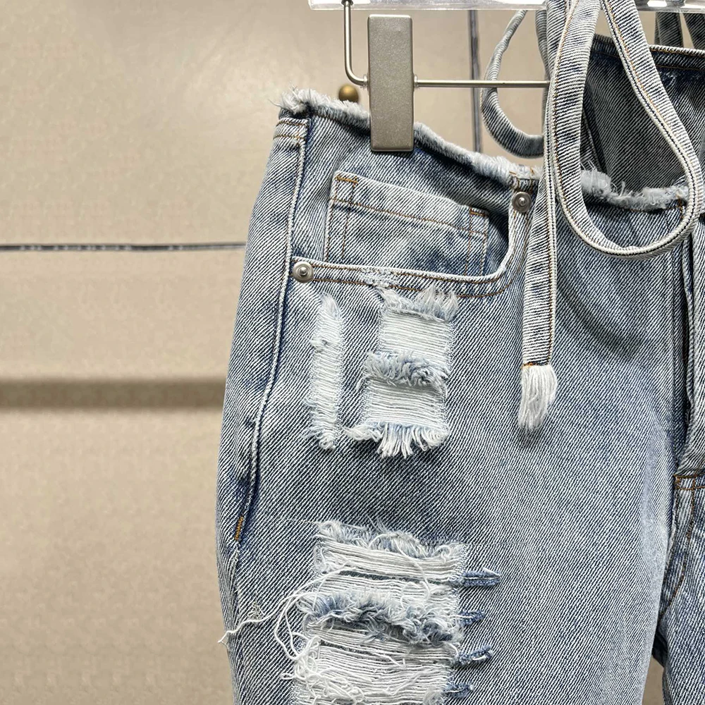 Damskie jeansy bawełniane Y2k Vintage sprane dziury przetarcia spodnie ażurowe ozdobione gorącymi diamentami proste spodnie nowość jesień 2025