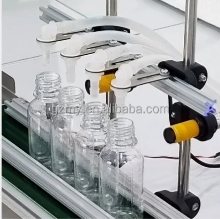 new design oil juice liquid water milk bottle filling machine 4 heads faster delivery time with high quality