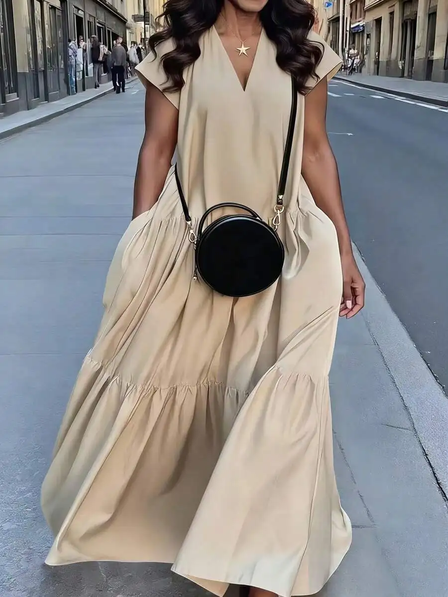 

Бежевое летнее повседневное платье макси свободного кроя с V-образным вырезом, оборками и рукавами-крылышками