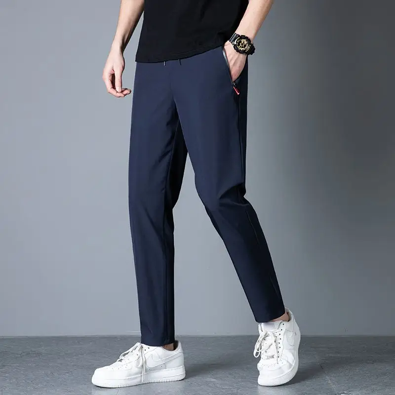 Men's casual pants straight leg slim fit elastic waist jogging pants Korean classic blue black gray men's pants plus size 4XL5XL
