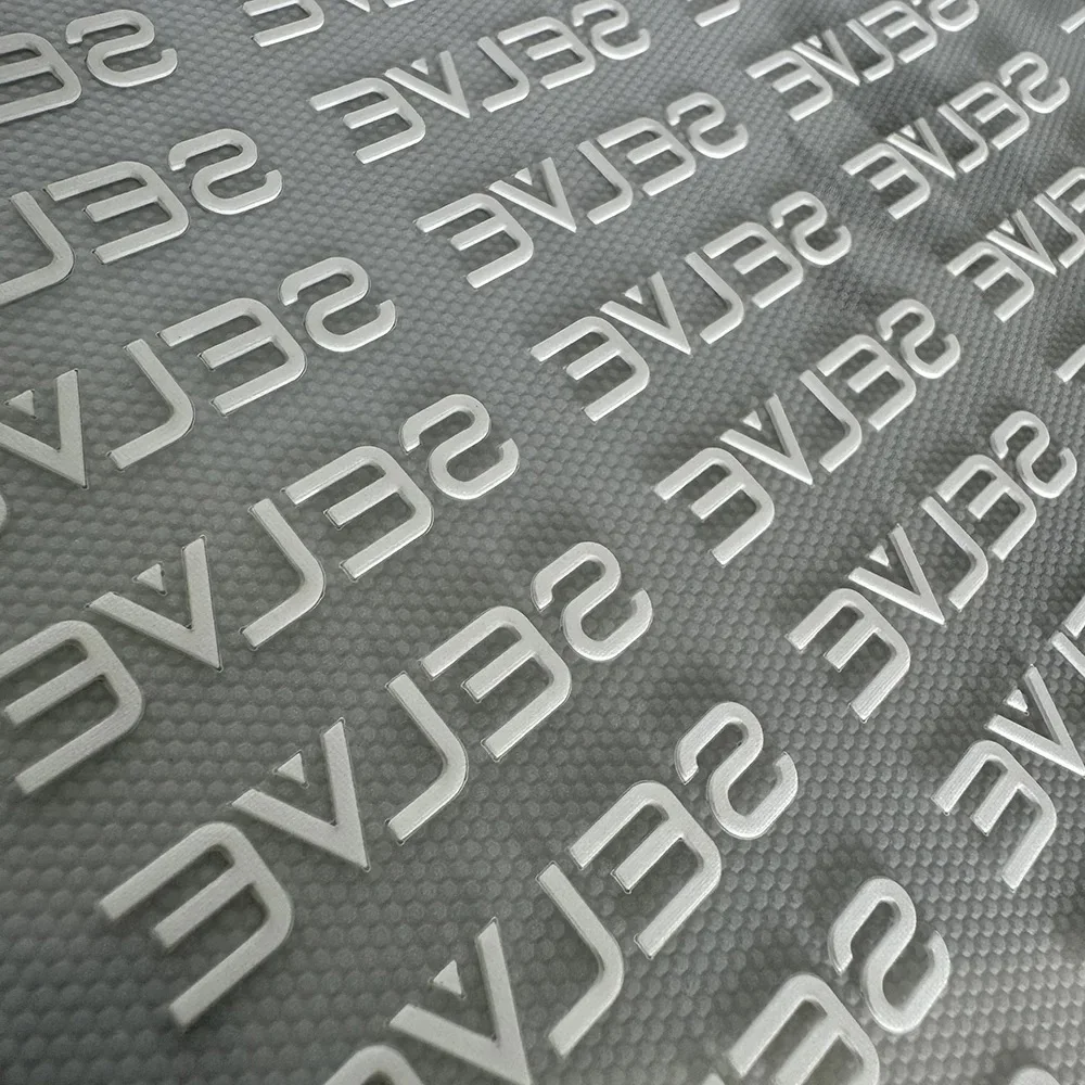 

TC Heat Transfer One Color 1.0mm Thick Label 3D Silicone Hot Stamping Soft Label Fabric Chest Label Custom Logo Branding Logo