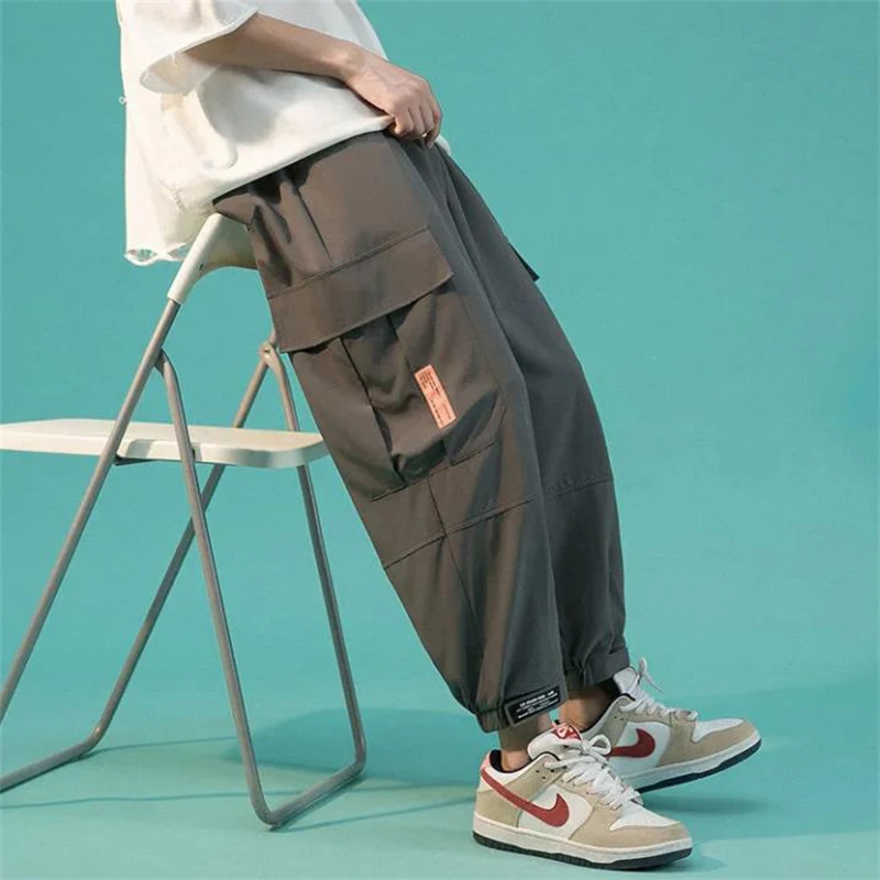 

Casual Harem Pants Men Hip Hop Style Loose Jogging Sweatpants Male Fashion Cargo Pants Elastic Waist Trousers