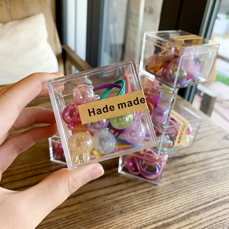 

Хит продаж: Набор детских резинок для волос (1 шт.) с разноцветными сердечками и звездами, высокоэластичные, не повреждают волосы, мягкая упаковка в коробке