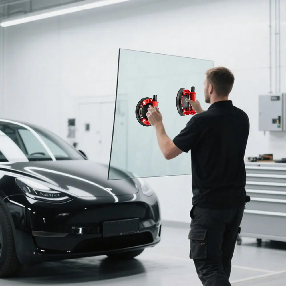 Heavy-duty vacuum suction cups.Handheld lifting sucker, carrying capacity 220 kg. Material handling: Tiles, large glass