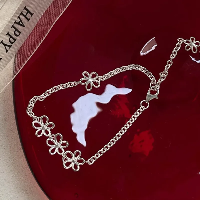 

PONYKISS Tibetan Silver Hollowed Flower Charm Bracelets for Women Cute Plant Fashion Jewelry Minimalist Personality Accessories