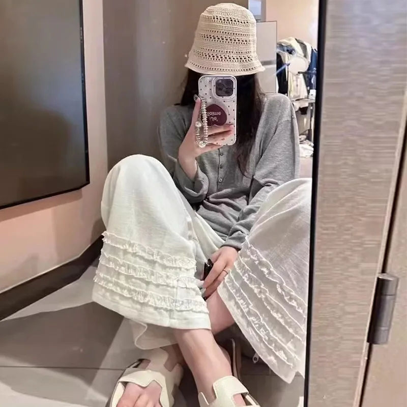 

Новинка 2023 года, летние женские повседневные брюки свободного покроя с высокой талией и девятью точками, рюшами по подолу и широкими штанинами.