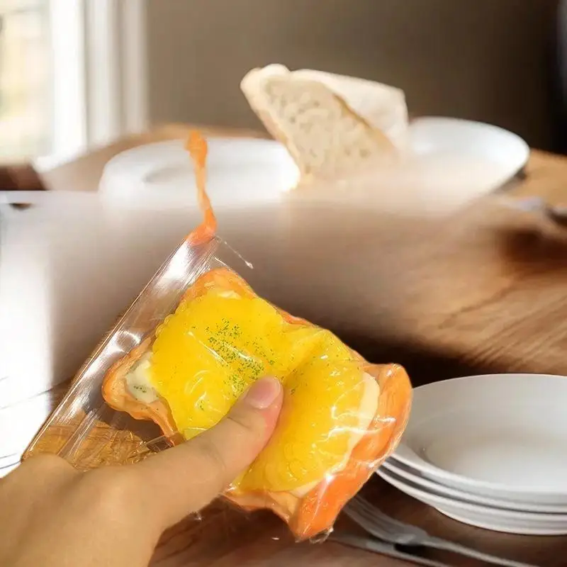 Brinquedos de pelúcia feitos à mão de tarta de ovo de milho de uma peça; Adereços de apertar para redução de estresse para jogos musicais infantis