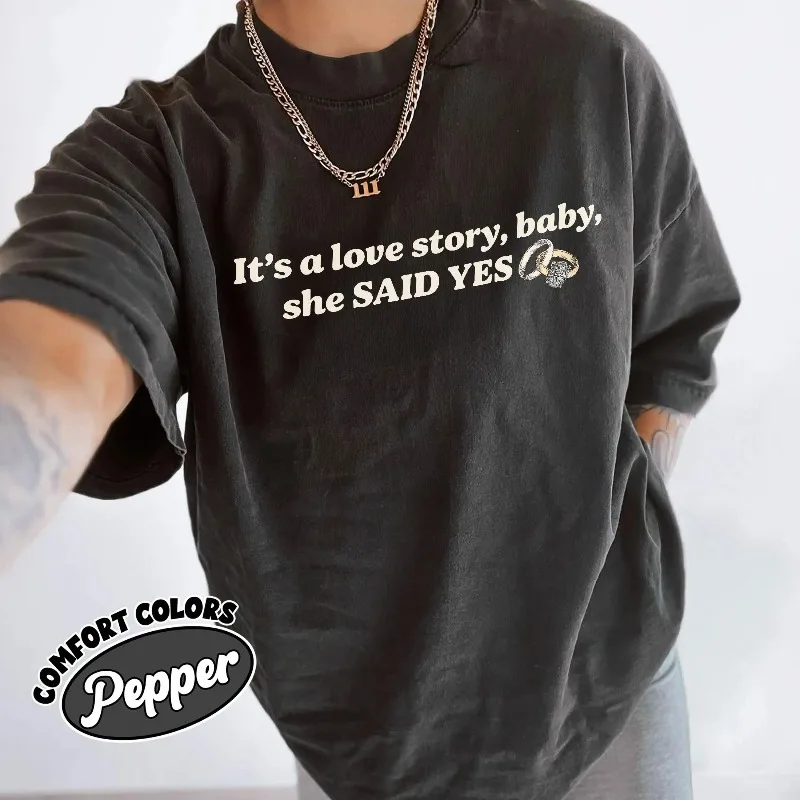 Autumn New Base Shirt Unisex T-shirt,It’s A Love Story And Baby She Said Yes Shirt, Funny Tayvis Engagement T Shirt,