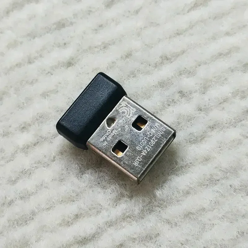 USB-адаптер приемника для беспроводной клавиатуры и мыши Logitech MK470 USB-адаптер приемника для беспроводной клавиатуры и мыши Logitech MK470