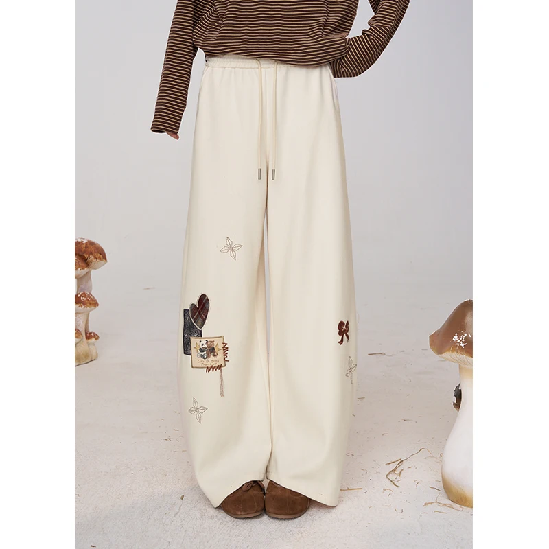 ELFSACK 2025 Winter New Arrivals Casual Cute Drawstring Cartoon Embroidery Loose Fit Sweatpants For Woman