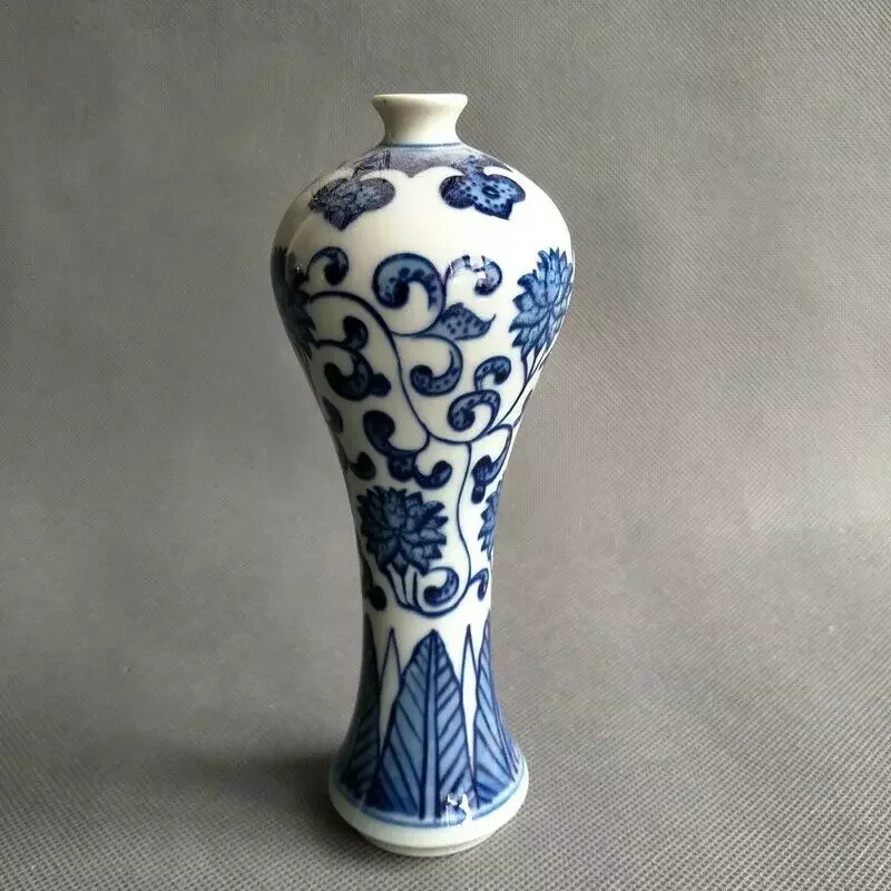 Hand-painted floral design on a blue and white porcelain vase, China