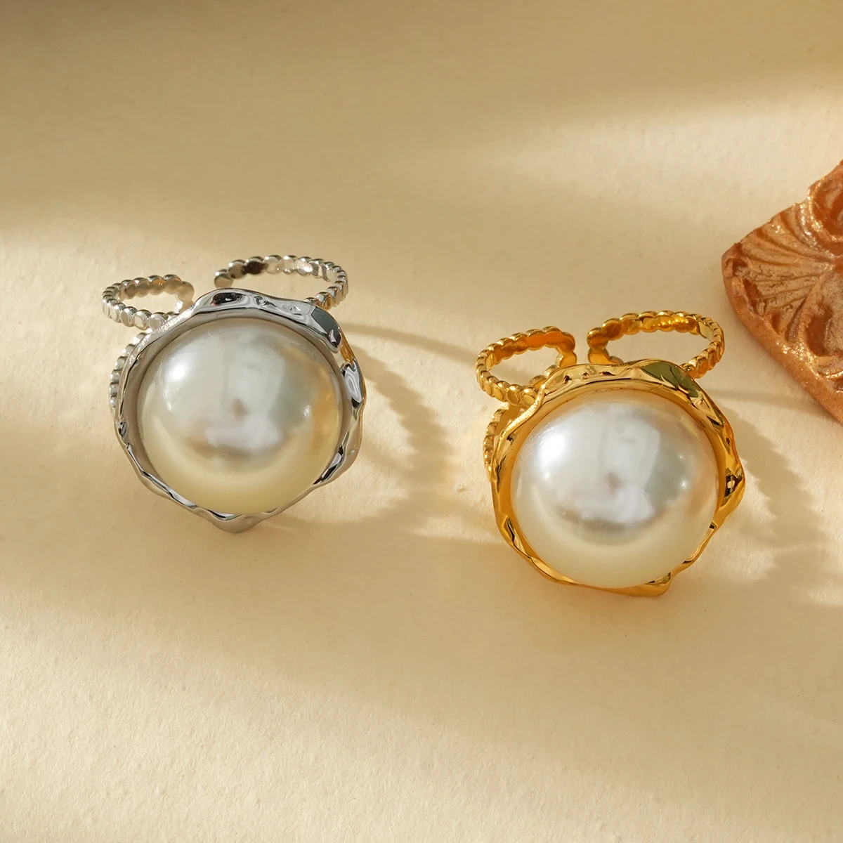 high-end ring featuring exquisite pearl inlay and 14k gold-plated stainless steel, suitable for professional-wearing women.