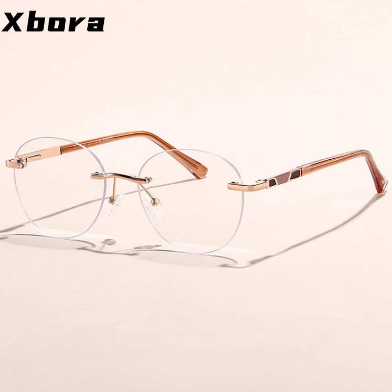 

Xbora женские круглые очки без оправы из сплава, простой дизайн, UV400, блокирующие синий свет, оптические очки по рецепту 79008