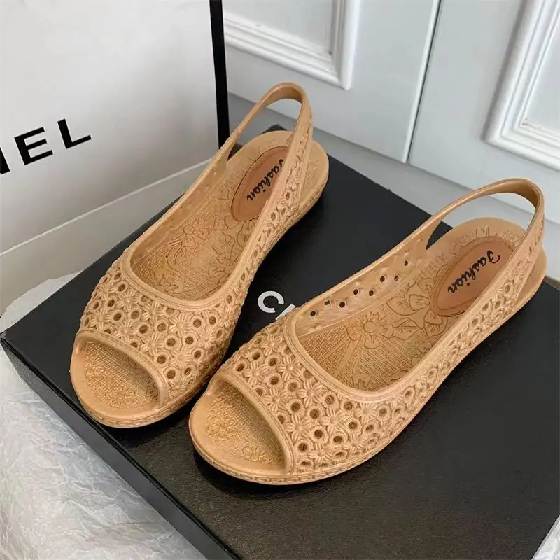 

2024 New Women's Summer One Word Hollow Flat Sole Sandals Soft Sole Non Slip Shallow Slip-On Outdoor Beach Sandals Peep Toe Shoe