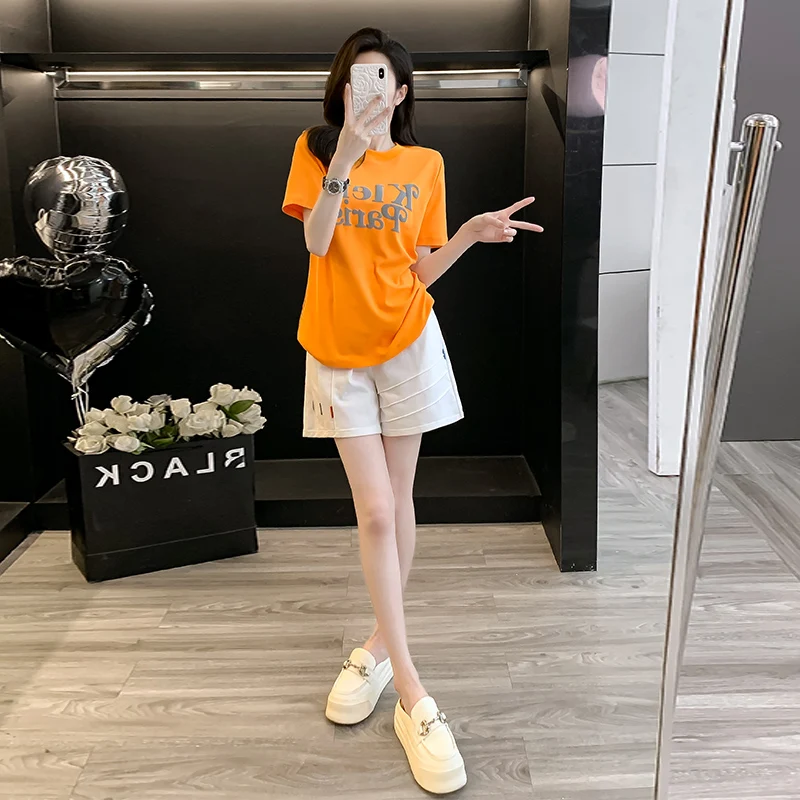 Korean version of 2024summer new loose orange short sleeved top sports set women's fashionable age reducing shorts two-piece set