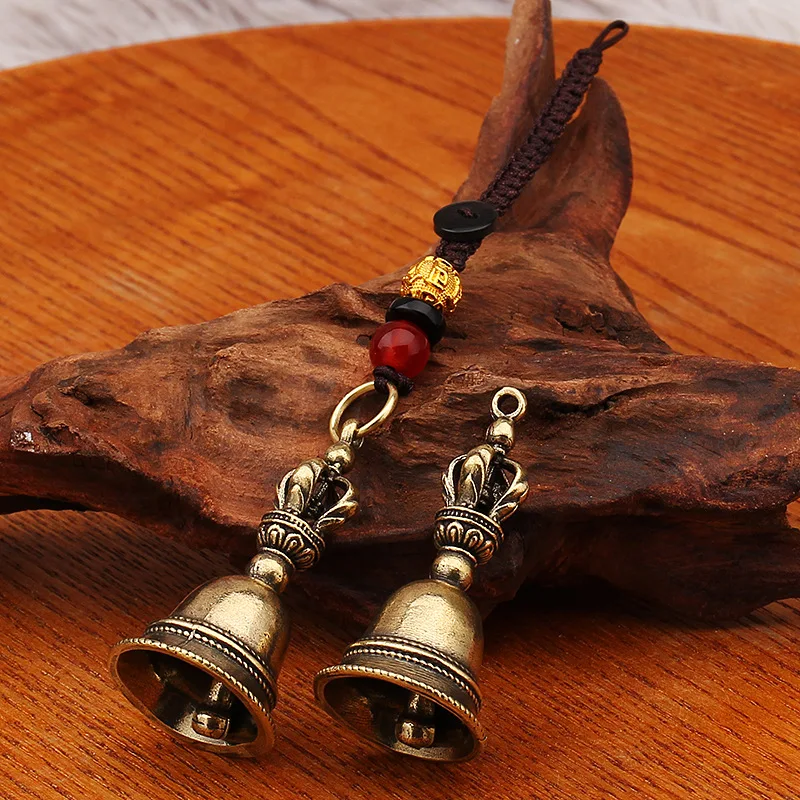 

Handcrafted Bronze Exorcism Bell Pendant - Vintage Tibetan Vajra Keychain with Woven Rope for Bags Purse Boho Spiritual Decor