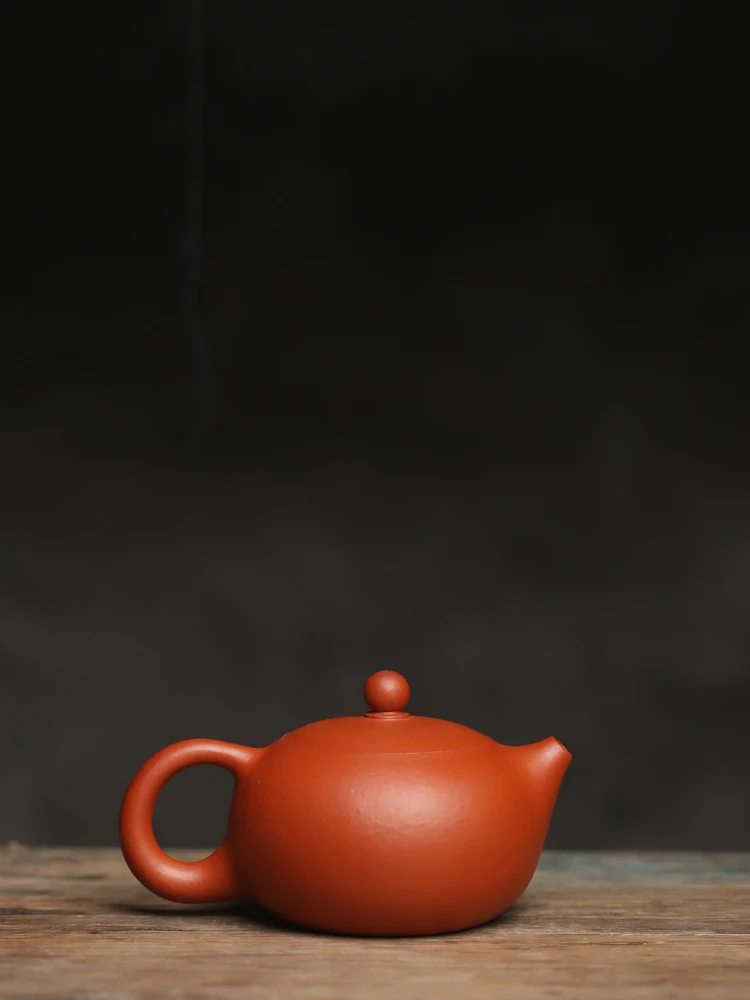 Xitang Village Chaozhou Fully Handmade Yixing Purple Sand Zhu Mud Kung Fu Pouring Handle Xishi Pot Tea