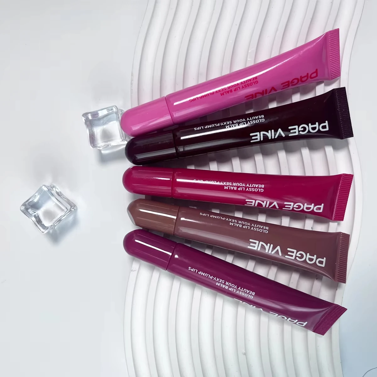 مجموعة بلسم الشفاه الملمع الشفاه مكونة من 5 ألوان - جل سائل مرطب يدوم طويلاً، جوهر العناية بالشفاه وتوت القهوة، هدية عيد الحب