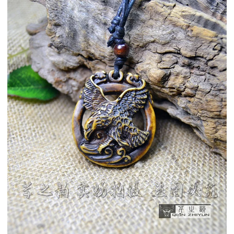 

Men's necklace eagle pendant yak bone carving ivory carving pendant Yiwu tourism Ornament Factory Direct Sales Wholesale