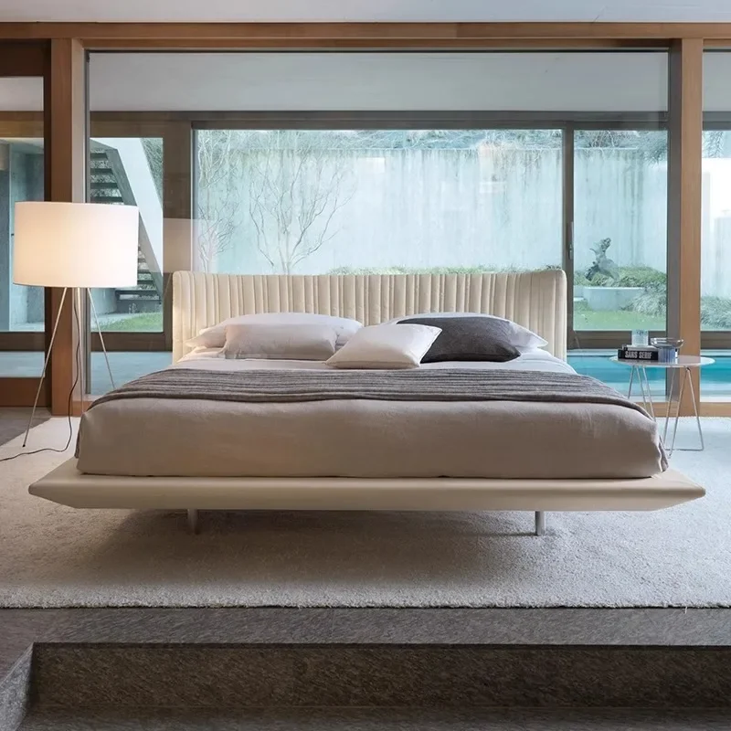 Cream style floating bed, minimalist high foot, off-white Internet celebrity shell, high-end atmosphere