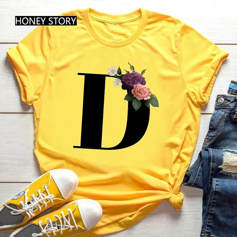 Heißer Verkauf, große Blumen, 26 englische Buchstaben, schwarzer Modetrend-Druck, lässiges gelbes T-Shirt für Herren und Damen, kurze Ärmel