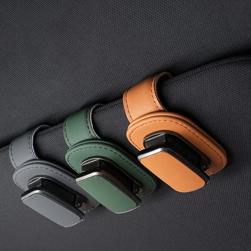Heavy-duty PU Leather Car Sun Visor Clip & Eyewear Holder, one-click dashboard organizer, compatible with smartphones.