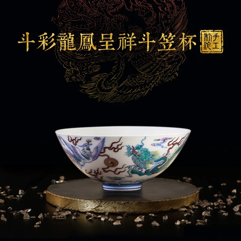 Handmade blue-and-white doucai dragon and phoenix master tea cup at Jingdezhen kiln site, single-handed painted