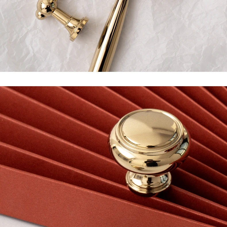 Gold round knob with a stepped rim on a red background