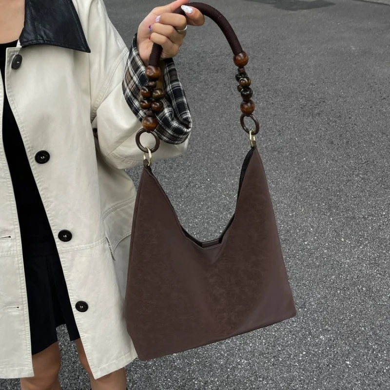 Deluxe dameshandtas gemaakt van achthoekig bedrukt leer, trendy Wales Vintage Commuter ruime stijl