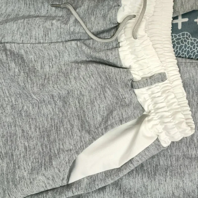 グレーの巾着スウェットパンツ,カジュアル,ハイウエスト,ルーズフィット,パッチワーク,ストリートウェア,ヒップホップ,トレンディ,春,夏