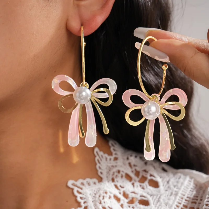 

Sweet girl pink bow pearl earrings with three-dimensional bow and pearl embellishment, fresh and ethereal long earrings