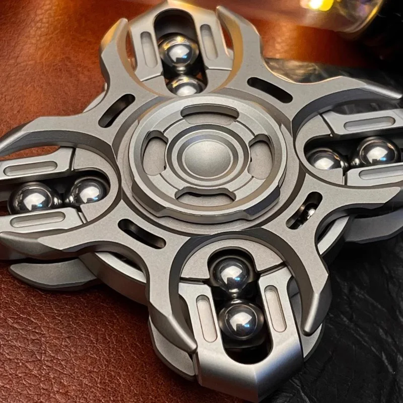 Oracle Diapason Gyro Fidget Spinner Suono nitido Collegamento bifacciale Giocattolo antistress Decompressione in metallo Giocattolo giroscopico con punta delle dita