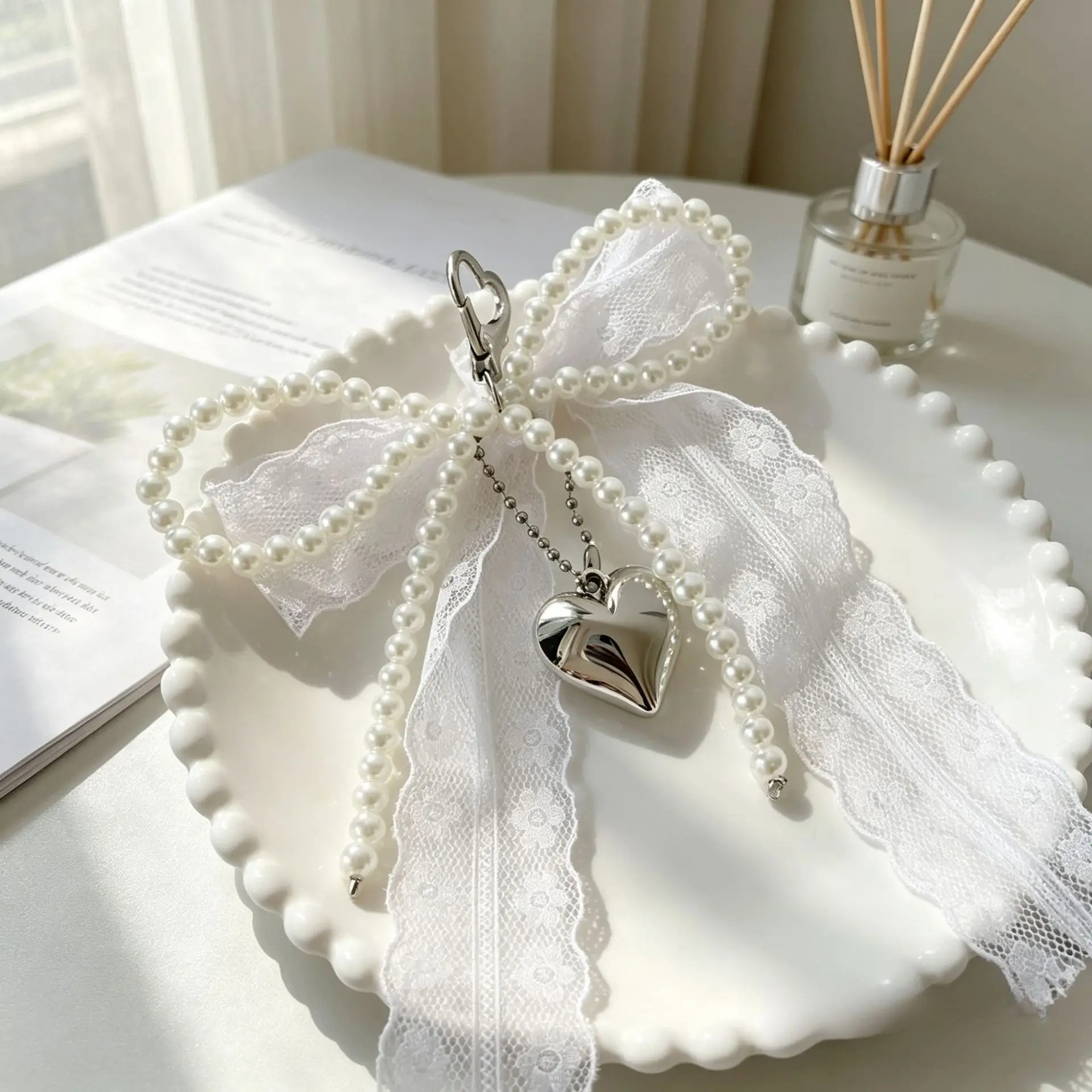 Super versatile Korean-style pearl bow phone chain pearl string shoe accessories simple bag buckle cup pendant