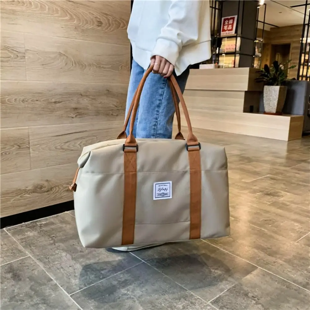 Bolsa de viaje de gran capacidad de primera calidad, bolso de mano de tela Oxford para cabina, bolso de viaje separado en seco y húmedo ajustable para mujer