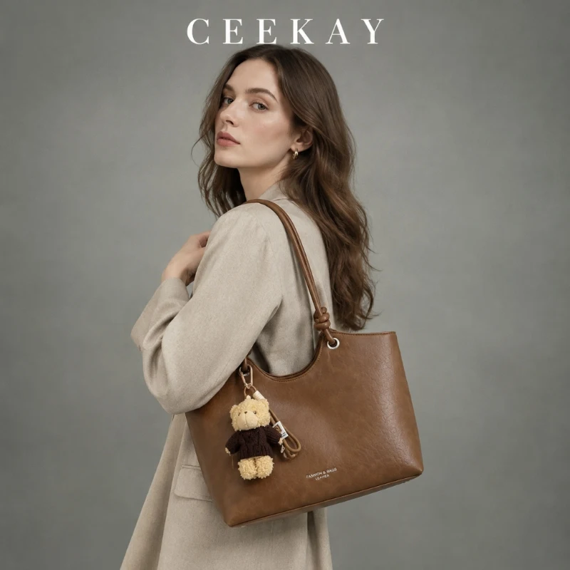 CEEKAY Brown Textured Leather Tote Bag Knotted Twin Strap Bear Charm All-Match Daily Wear Spacious Elegant Classic Shoulder Bag