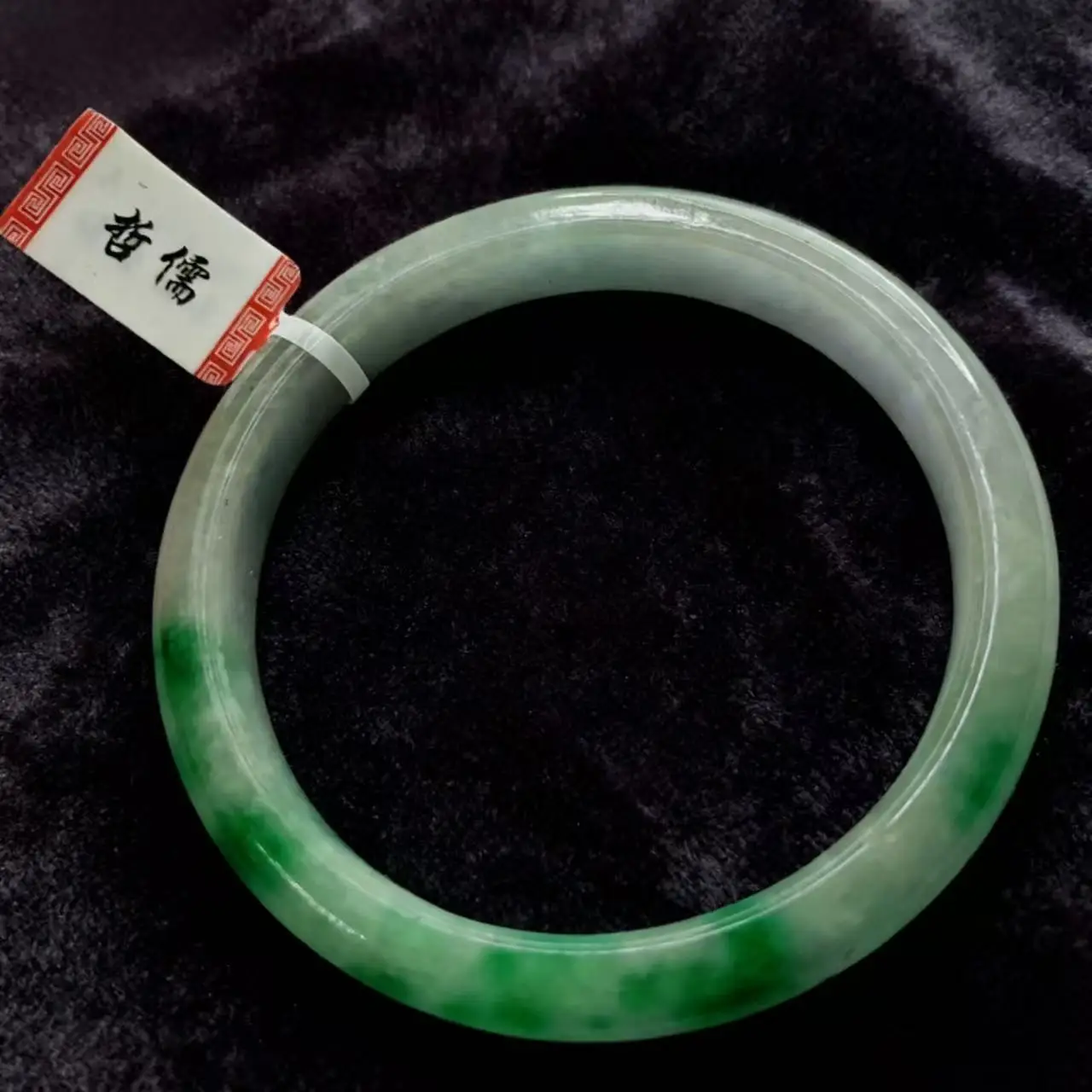 

One on one real shooting of light green color 61.7mm jade bracelet, good luck