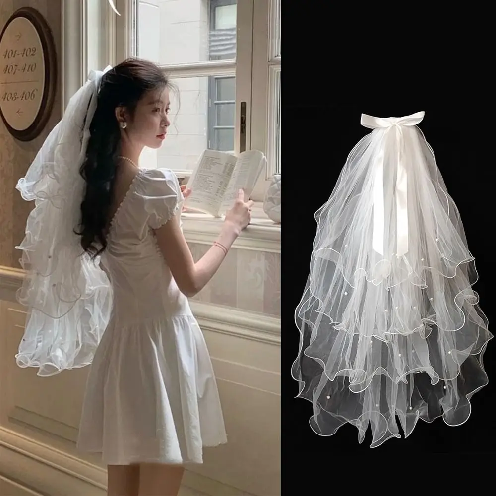 

Элегантная четырехслойная фата из мягкого тюля с жемчужным бантом, лента, свадебная фата, белая скрученная голова невесты, марлевые свадебные аксессуары