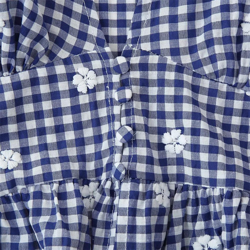 Verão novo feminino doce e versátil com decote em v mangas bufantes flor bordado pequena grade curto topo