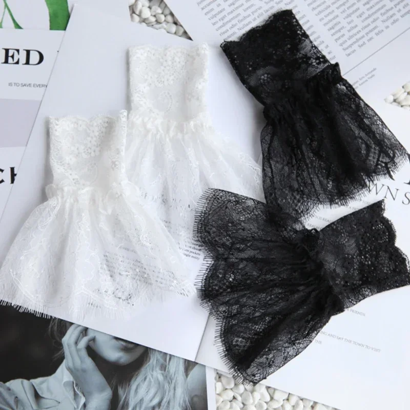 Maniche finte da donna con nappe corte Polsino plissettato bianco e nero Bellissimi accessori in pizzo