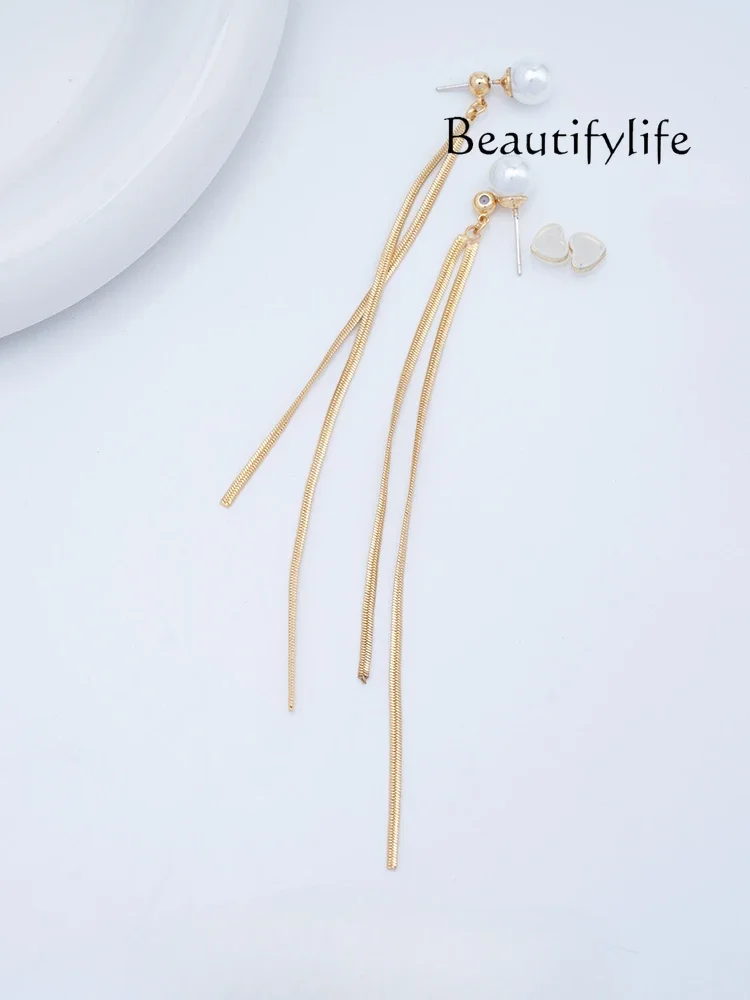 Cold wind silver ear clips women's round face super long fringed earrings niche high-end mosquito coil disc earrings