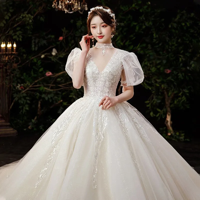 

A dreamy and ethereal dress with deep collar large tail