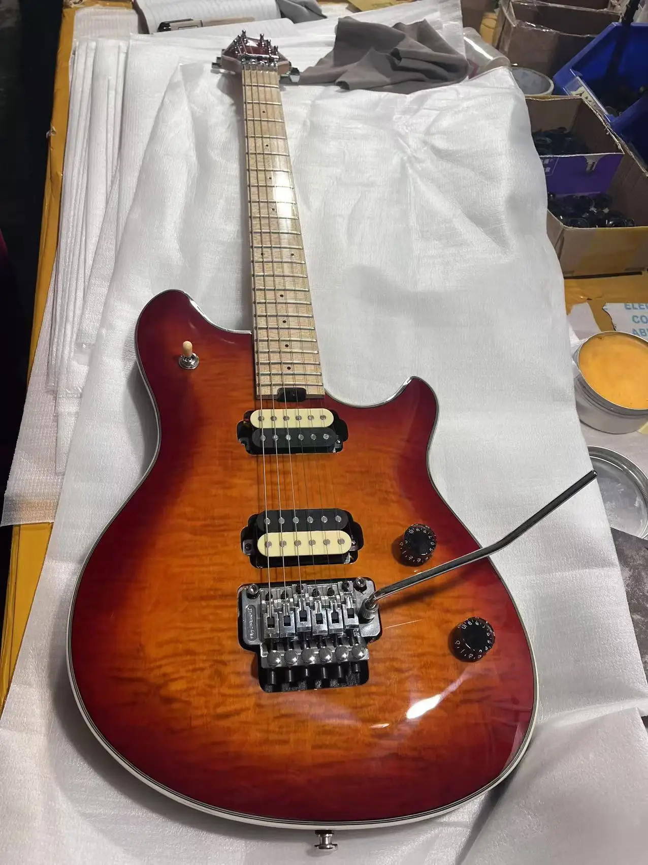 

Factory direct sales of high quality electric guitar tomato color on sale chitarra elettrica Guitar with rocker